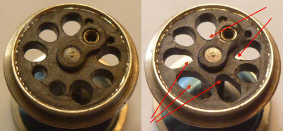 Бормашиной расширил и придал форму некоторым вырезам в колесном центре (слева исходник, справа - после обработки)